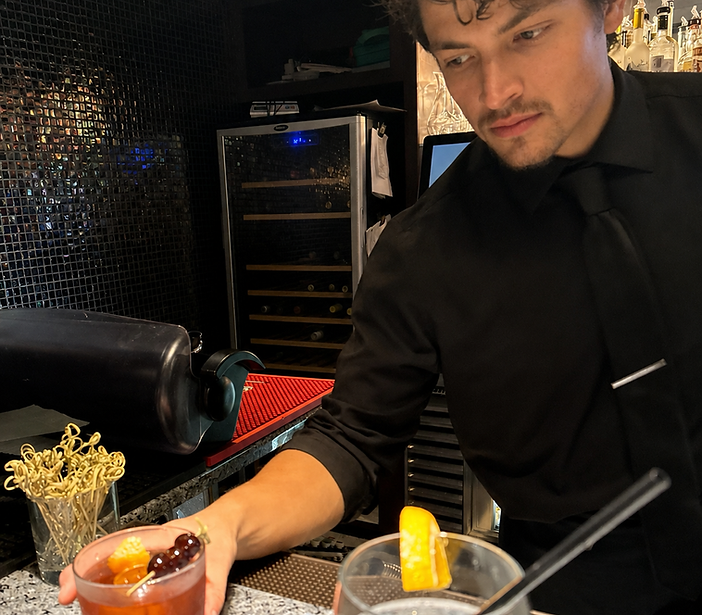 Darian Meza, owner and lead bartender at a professional bar setup